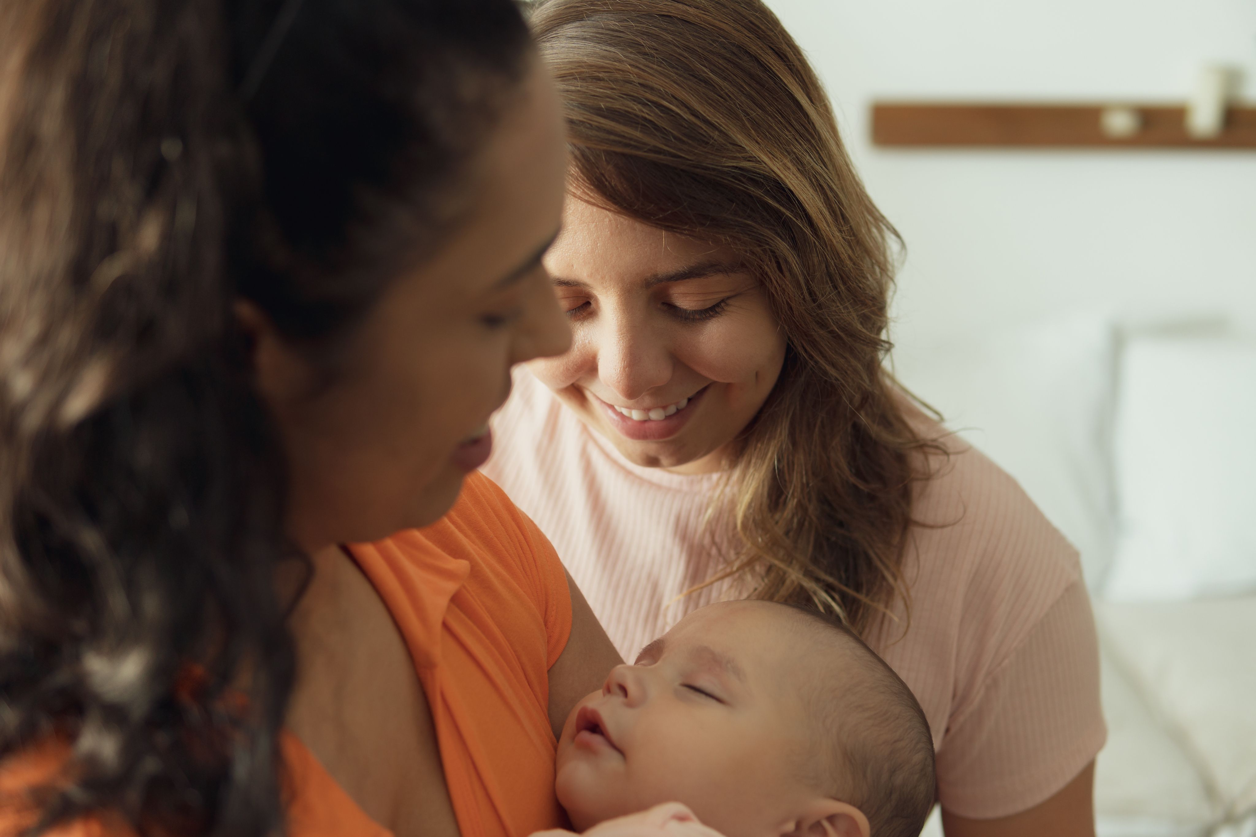 Mother, baby, and daughter